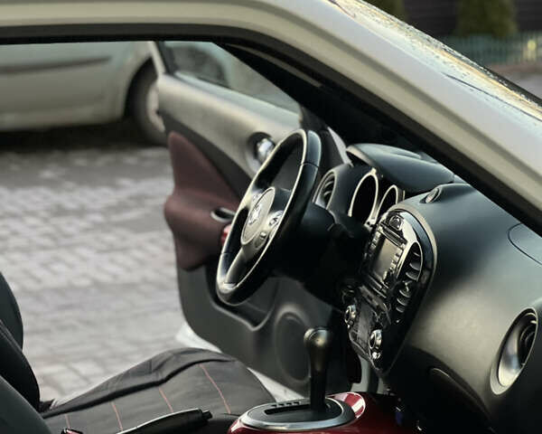 Белый Ниссан Жук, объемом двигателя 1.6 л и пробегом 77 тыс. км за 11500 $, фото 12 на Automoto.ua