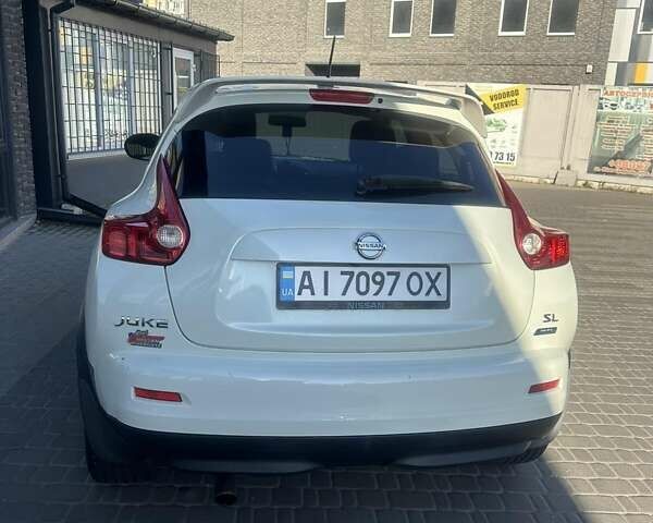 Белый Ниссан Жук, объемом двигателя 1.62 л и пробегом 100 тыс. км за 9900 $, фото 2 на Automoto.ua