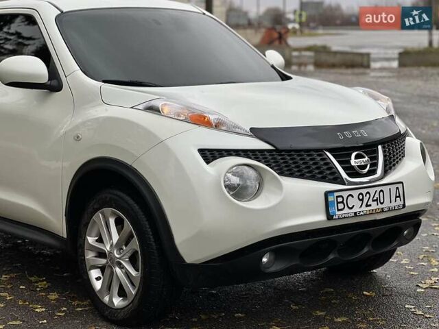 Белый Ниссан Жук, объемом двигателя 1.6 л и пробегом 255 тыс. км за 8999 $, фото 7 на Automoto.ua