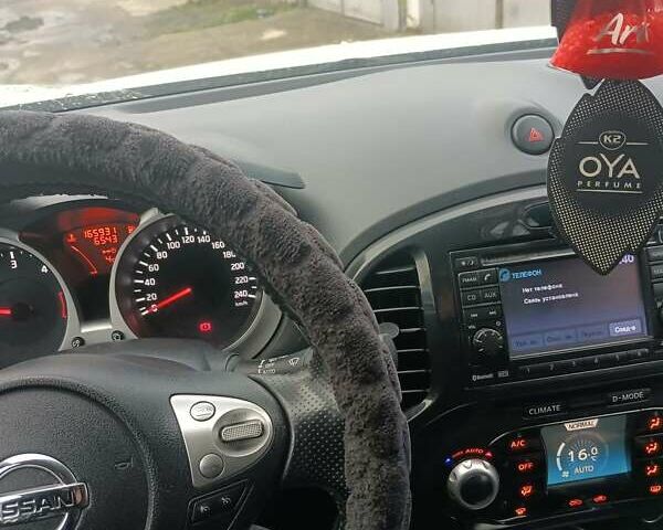 Белый Ниссан Жук, объемом двигателя 1.46 л и пробегом 165 тыс. км за 11400 $, фото 3 на Automoto.ua