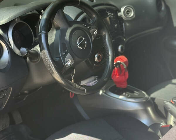 Белый Ниссан Жук, объемом двигателя 1.6 л и пробегом 217 тыс. км за 9600 $, фото 11 на Automoto.ua