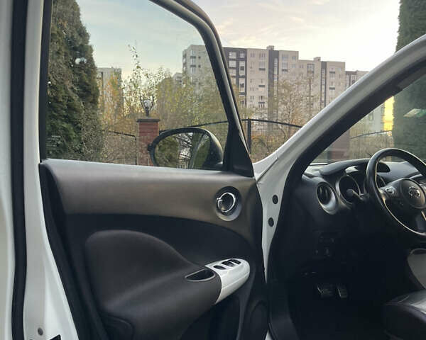 Білий Ніссан Жук, об'ємом двигуна 1.6 л та пробігом 155 тис. км за 10599 $, фото 17 на Automoto.ua