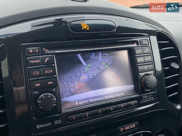 Белый Ниссан Жук, объемом двигателя 1.6 л и пробегом 85 тыс. км за 9800 $, фото 12 на Automoto.ua