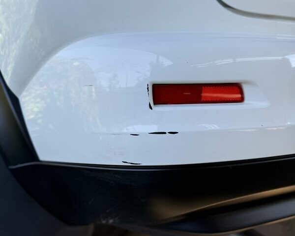 Белый Ниссан Жук, объемом двигателя 1.6 л и пробегом 151 тыс. км за 9800 $, фото 16 на Automoto.ua