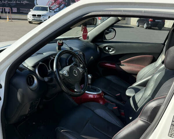 Белый Ниссан Жук, объемом двигателя 1.62 л и пробегом 190 тыс. км за 9000 $, фото 6 на Automoto.ua