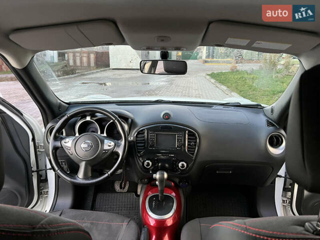 Белый Ниссан Жук, объемом двигателя 1.6 л и пробегом 77 тыс. км за 11500 $, фото 15 на Automoto.ua