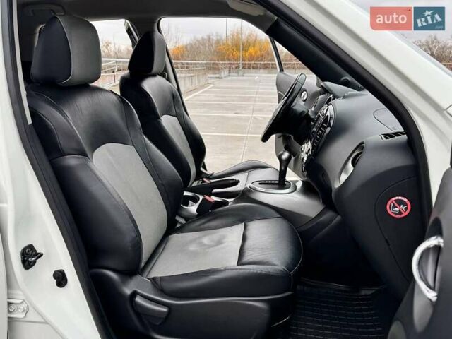 Белый Ниссан Жук, объемом двигателя 1.6 л и пробегом 115 тыс. км за 9900 $, фото 19 на Automoto.ua