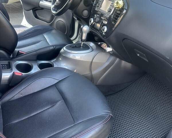 Белый Ниссан Жук, объемом двигателя 1.62 л и пробегом 100 тыс. км за 9900 $, фото 4 на Automoto.ua