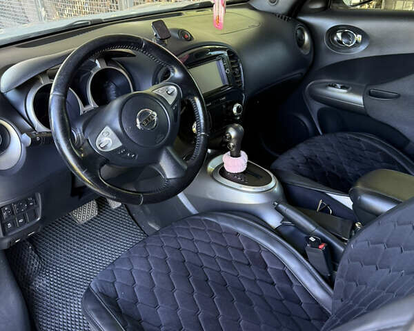 Белый Ниссан Жук, объемом двигателя 1.6 л и пробегом 151 тыс. км за 9800 $, фото 7 на Automoto.ua