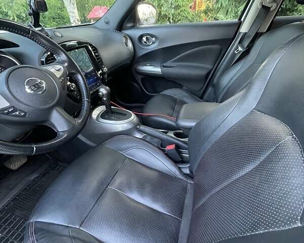 Белый Ниссан Жук, объемом двигателя 1.6 л и пробегом 157 тыс. км за 11700 $, фото 9 на Automoto.ua