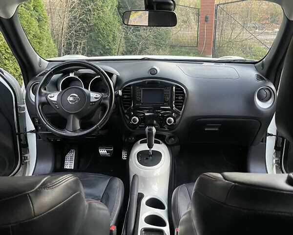 Білий Ніссан Жук, об'ємом двигуна 1.6 л та пробігом 155 тис. км за 10599 $, фото 23 на Automoto.ua