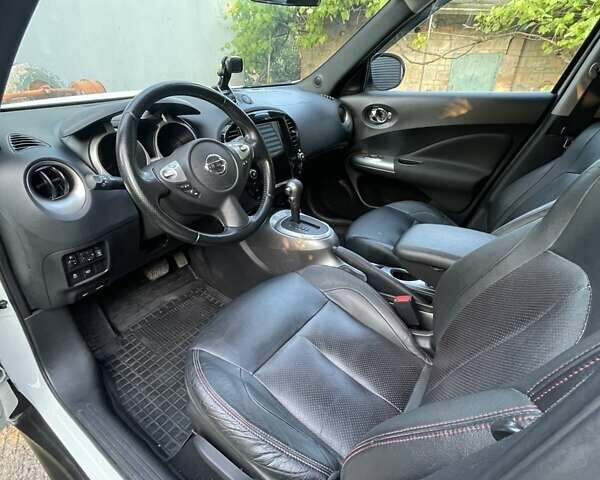 Белый Ниссан Жук, объемом двигателя 1.6 л и пробегом 157 тыс. км за 11700 $, фото 10 на Automoto.ua