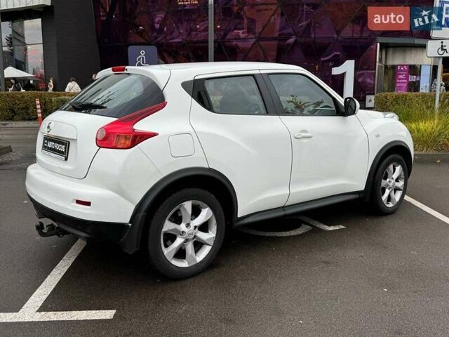 Белый Ниссан Жук, объемом двигателя 1.6 л и пробегом 175 тыс. км за 12490 $, фото 7 на Automoto.ua