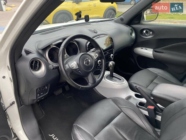 Белый Ниссан Жук, объемом двигателя 1.6 л и пробегом 138 тыс. км за 10500 $, фото 11 на Automoto.ua