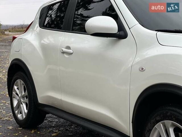 Белый Ниссан Жук, объемом двигателя 1.6 л и пробегом 255 тыс. км за 8999 $, фото 1 на Automoto.ua