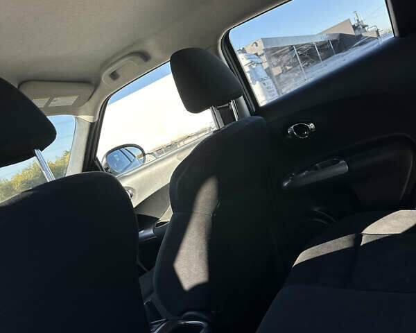 Белый Ниссан Жук, объемом двигателя 1.6 л и пробегом 190 тыс. км за 8500 $, фото 6 на Automoto.ua