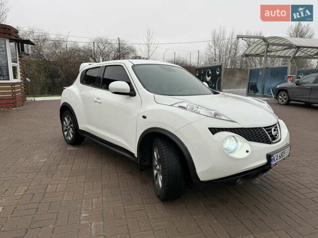 Белый Ниссан Жук, объемом двигателя 1.6 л и пробегом 106 тыс. км за 10400 $, фото 1 на Automoto.ua