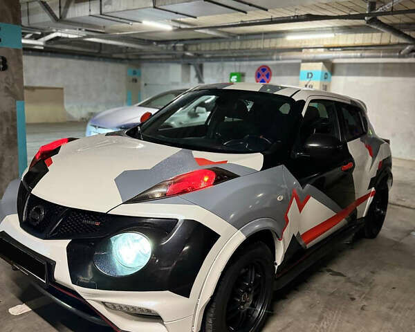 Белый Ниссан Жук, объемом двигателя 1.6 л и пробегом 126 тыс. км за 8000 $, фото 1 на Automoto.ua