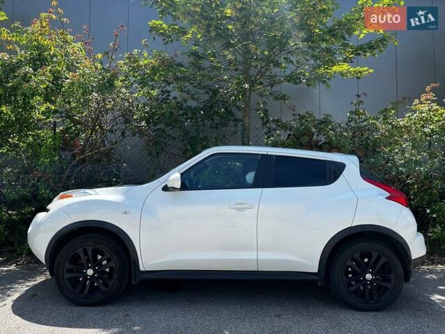 Белый Ниссан Жук, объемом двигателя 1.6 л и пробегом 170 тыс. км за 11000 $, фото 5 на Automoto.ua