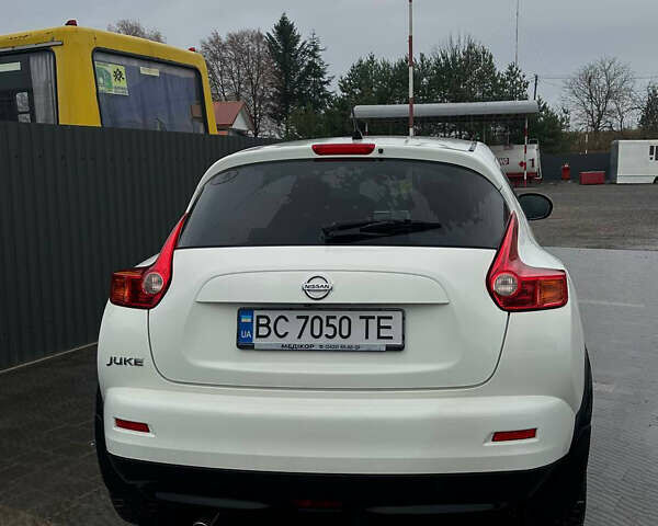 Белый Ниссан Жук, объемом двигателя 1.6 л и пробегом 136 тыс. км за 10500 $, фото 4 на Automoto.ua