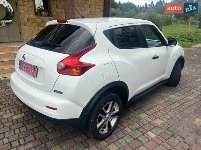 Белый Ниссан Жук, объемом двигателя 1.5 л и пробегом 250 тыс. км за 11100 $, фото 8 на Automoto.ua