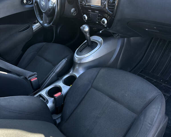 Белый Ниссан Жук, объемом двигателя 1.6 л и пробегом 190 тыс. км за 8500 $, фото 3 на Automoto.ua