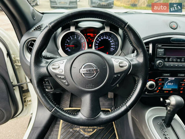 Белый Ниссан Жук, объемом двигателя 1.57 л и пробегом 106 тыс. км за 11500 $, фото 26 на Automoto.ua