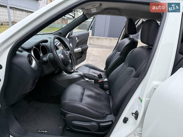 Белый Ниссан Жук, объемом двигателя 1.6 л и пробегом 64 тыс. км за 12700 $, фото 20 на Automoto.ua