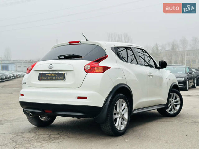 Белый Ниссан Жук, объемом двигателя 1.57 л и пробегом 106 тыс. км за 11500 $, фото 1 на Automoto.ua