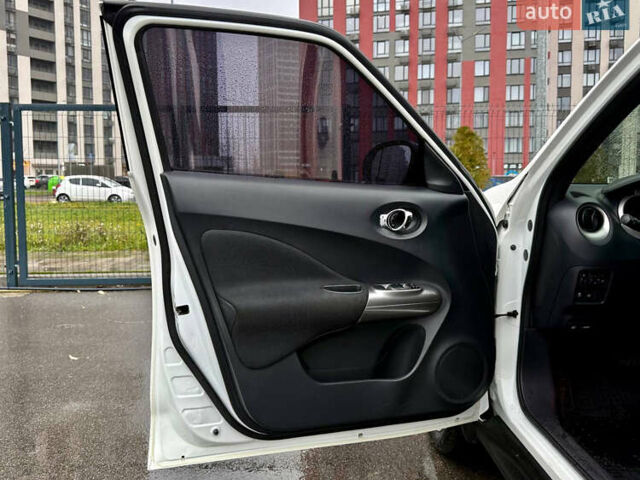 Белый Ниссан Жук, объемом двигателя 1.6 л и пробегом 175 тыс. км за 9500 $, фото 14 на Automoto.ua