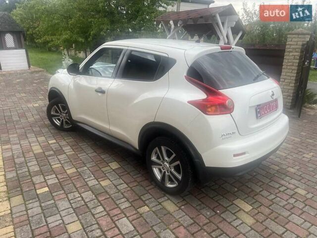 Белый Ниссан Жук, объемом двигателя 1.5 л и пробегом 250 тыс. км за 11100 $, фото 7 на Automoto.ua
