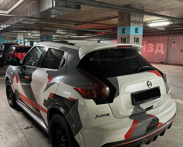 Белый Ниссан Жук, объемом двигателя 1.6 л и пробегом 126 тыс. км за 8000 $, фото 3 на Automoto.ua