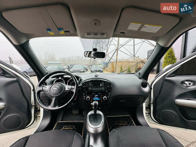 Белый Ниссан Жук, объемом двигателя 1.57 л и пробегом 106 тыс. км за 11500 $, фото 18 на Automoto.ua