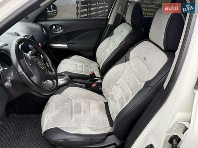 Белый Ниссан Жук, объемом двигателя 1.6 л и пробегом 106 тыс. км за 10400 $, фото 28 на Automoto.ua