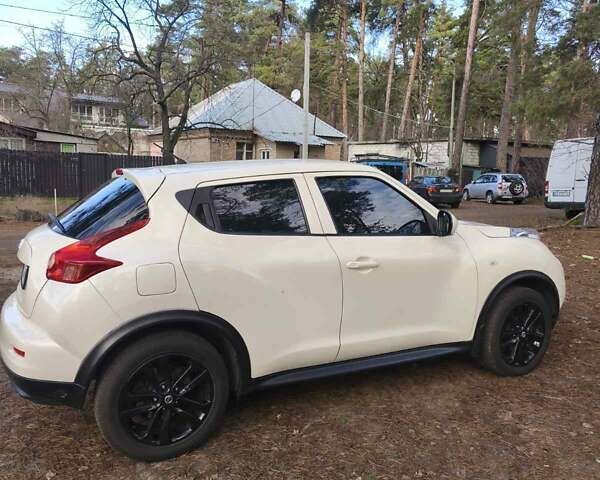 Белый Ниссан Жук, объемом двигателя 1.6 л и пробегом 170 тыс. км за 8900 $, фото 8 на Automoto.ua