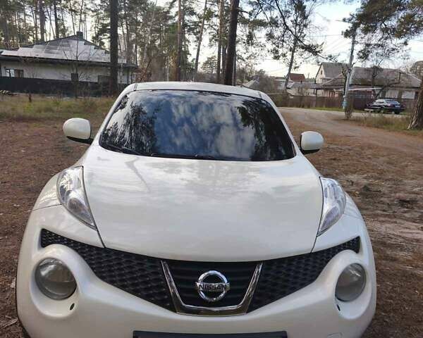 Белый Ниссан Жук, объемом двигателя 1.6 л и пробегом 170 тыс. км за 8900 $, фото 7 на Automoto.ua