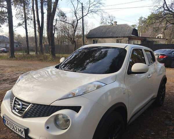 Белый Ниссан Жук, объемом двигателя 1.6 л и пробегом 170 тыс. км за 8900 $, фото 2 на Automoto.ua