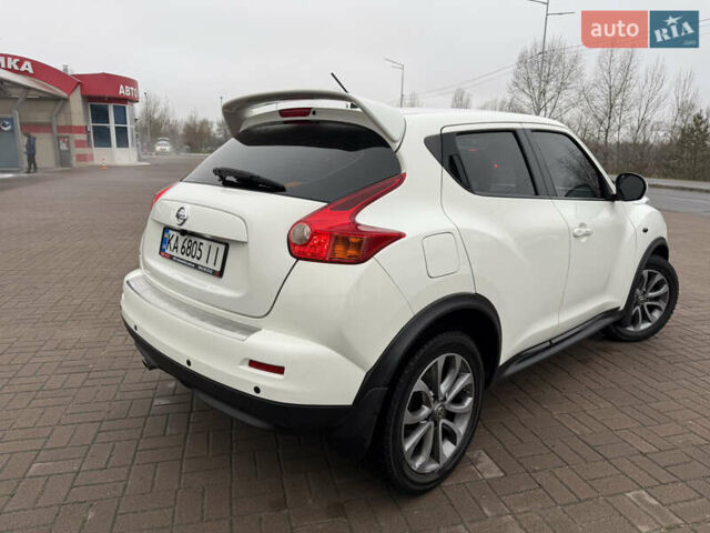 Белый Ниссан Жук, объемом двигателя 1.6 л и пробегом 106 тыс. км за 10400 $, фото 5 на Automoto.ua