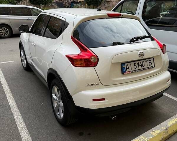 Белый Ниссан Жук, объемом двигателя 1.6 л и пробегом 175 тыс. км за 9500 $, фото 1 на Automoto.ua