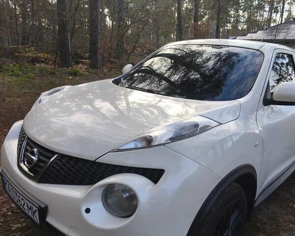 Белый Ниссан Жук, объемом двигателя 1.6 л и пробегом 170 тыс. км за 8900 $, фото 4 на Automoto.ua