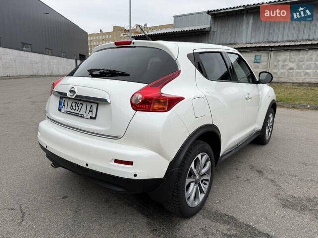 Белый Ниссан Жук, объемом двигателя 1.6 л и пробегом 64 тыс. км за 12700 $, фото 7 на Automoto.ua