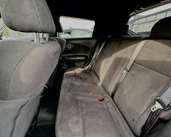 Белый Ниссан Жук, объемом двигателя 1.6 л и пробегом 140 тыс. км за 12400 $, фото 8 на Automoto.ua
