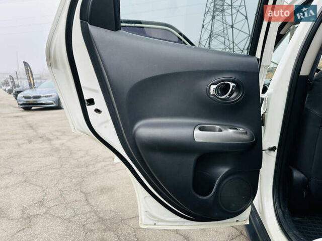 Белый Ниссан Жук, объемом двигателя 1.57 л и пробегом 106 тыс. км за 11500 $, фото 16 на Automoto.ua