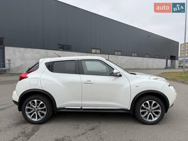 Белый Ниссан Жук, объемом двигателя 1.6 л и пробегом 64 тыс. км за 12700 $, фото 9 на Automoto.ua