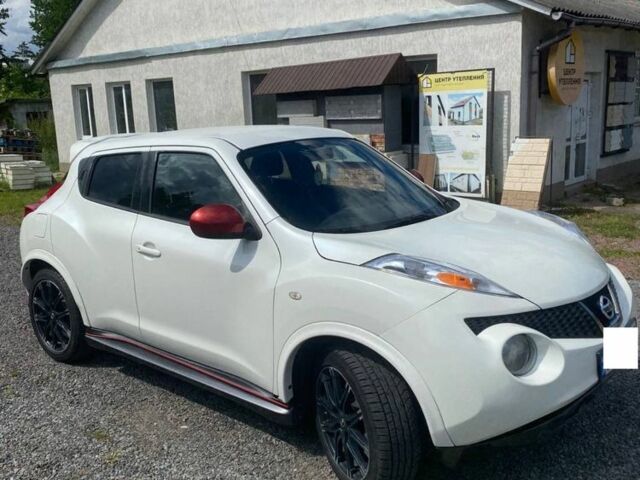 Белый Ниссан Жук, объемом двигателя 1.6 л и пробегом 150 тыс. км за 10900 $, фото 1 на Automoto.ua