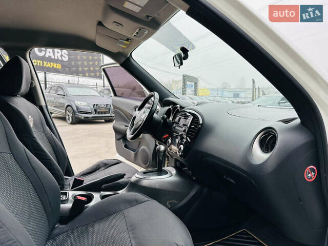 Белый Ниссан Жук, объемом двигателя 1.57 л и пробегом 106 тыс. км за 11500 $, фото 22 на Automoto.ua