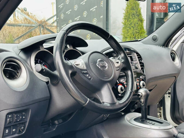 Белый Ниссан Жук, объемом двигателя 1.57 л и пробегом 106 тыс. км за 11500 $, фото 13 на Automoto.ua