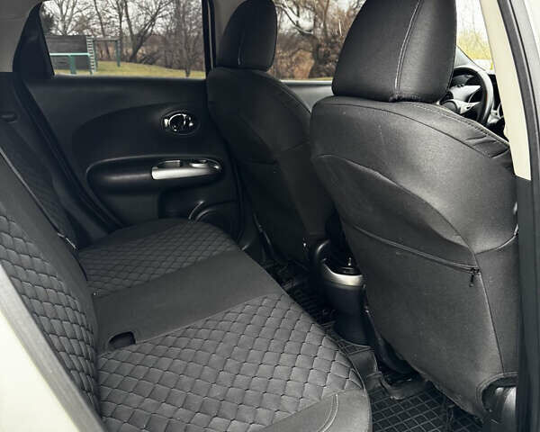 Белый Ниссан Жук, объемом двигателя 1.6 л и пробегом 92 тыс. км за 12999 $, фото 10 на Automoto.ua