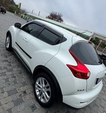 Білий Ніссан Жук, об'ємом двигуна 1.6 л та пробігом 125 тис. км за 10800 $, фото 4 на Automoto.ua