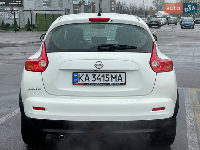 Белый Ниссан Жук, объемом двигателя 1.6 л и пробегом 120 тыс. км за 10600 $, фото 2 на Automoto.ua